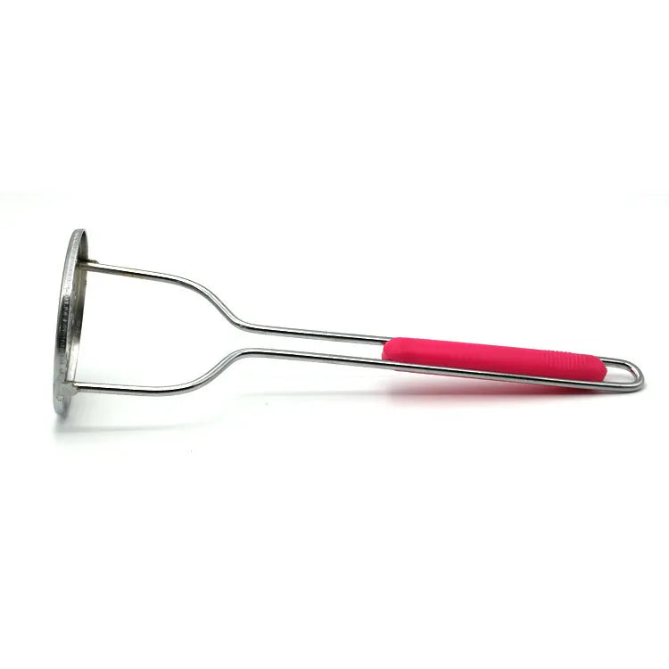Manual potato masher with wooden handle and flower-shaped iron plated press head on a light surface
