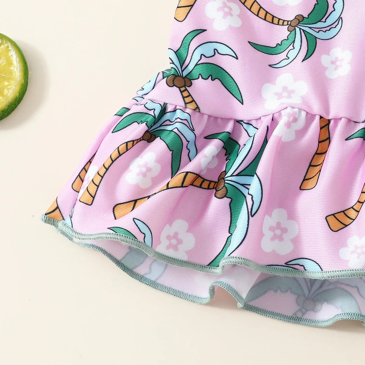 White polyester two-piece swimsuit set for girls with shirt top and shorts.