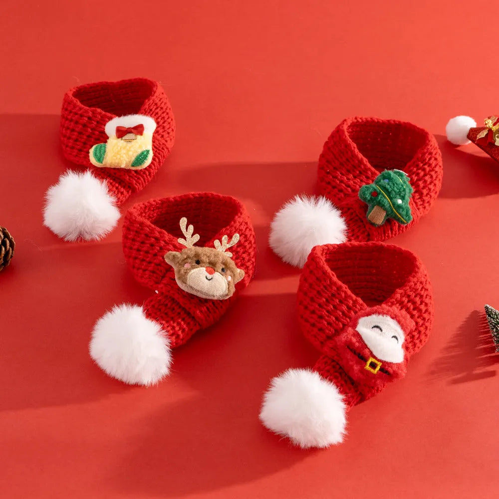 Christmas cat scarf with striped cartoon pattern in festive colours on a light background