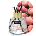 Glass bottle-shaped car perfume ornament for loose incense aromatherapy on a car dashboard.