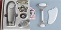 White jade double-headed facial roller and matching gua sha board set on a plain background.