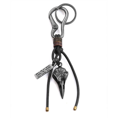 Retro leather rope keychain with lobster buckle and skull pendant in bronze and silver