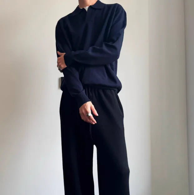Pure wool polo sweater with a lapel collar in milky white, showing loose fit and long sleeves.