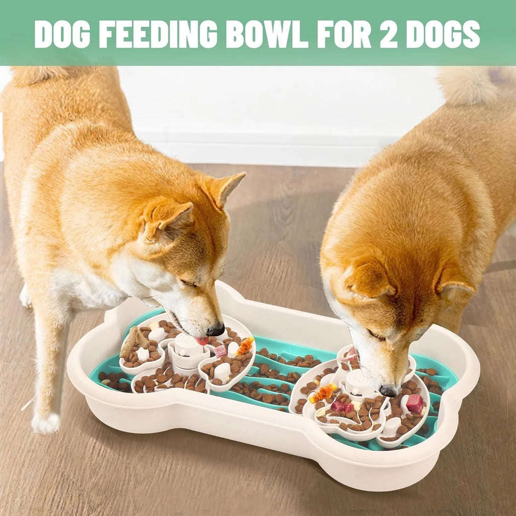 Large green slow feeder dog bowl with three rotating puzzle trays and anti-slip suction cups on base.