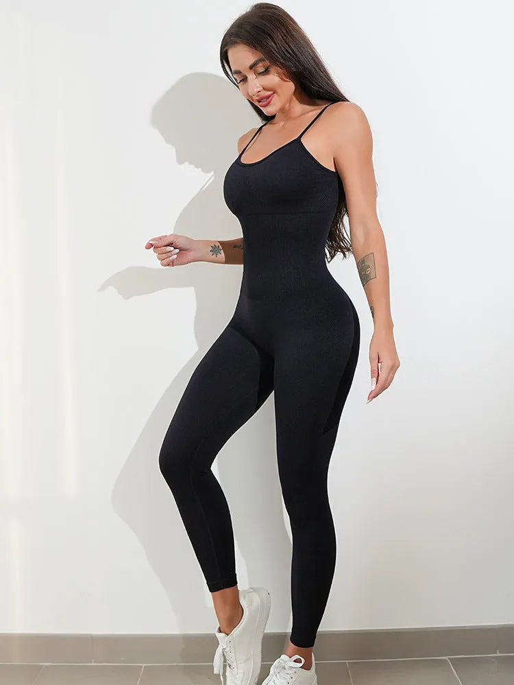 Women's black sleeveless jumpsuit with adjustable spaghetti straps and a backless design.