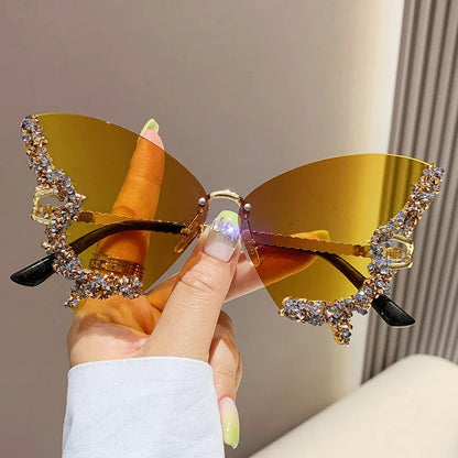 Luxury diamond-studded butterfly sunglasses in various gradient color options, featuring a vintage-inspired design and high-quality materials for a fashionable and glamorous look.