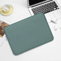 PU leather laptop liner bag in mint green for 13 to 17 inch devices, waterproof and shock-resistant