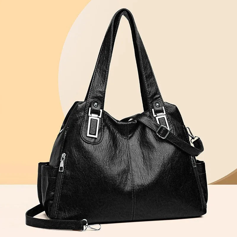 Women's soft PU tote bag in square vertical shape with single shoulder strap and internal zippered compartment