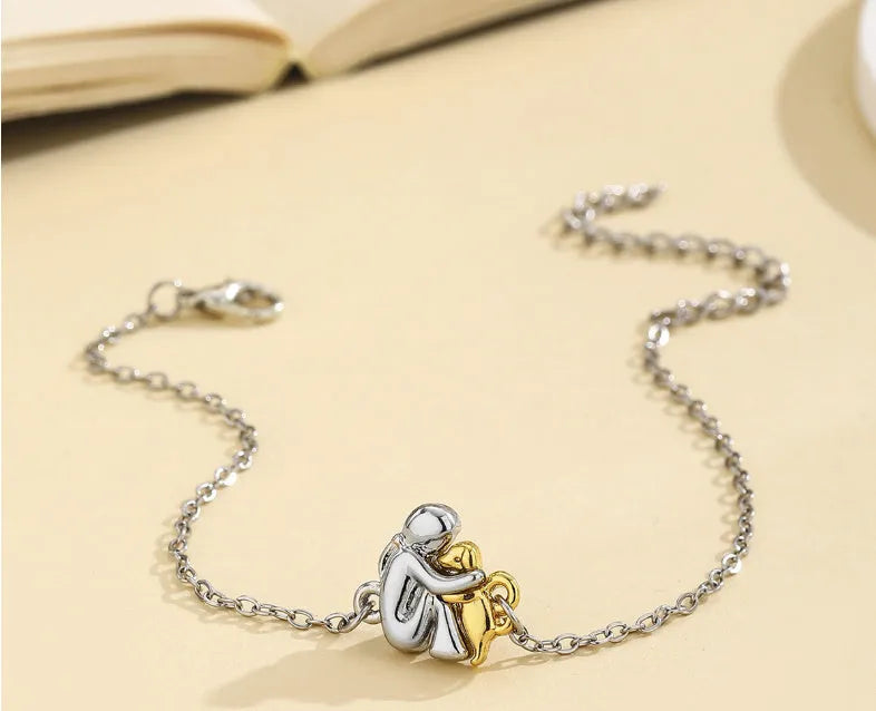 Woven black flexible wire couple bracelet with angel element and electroplated finish