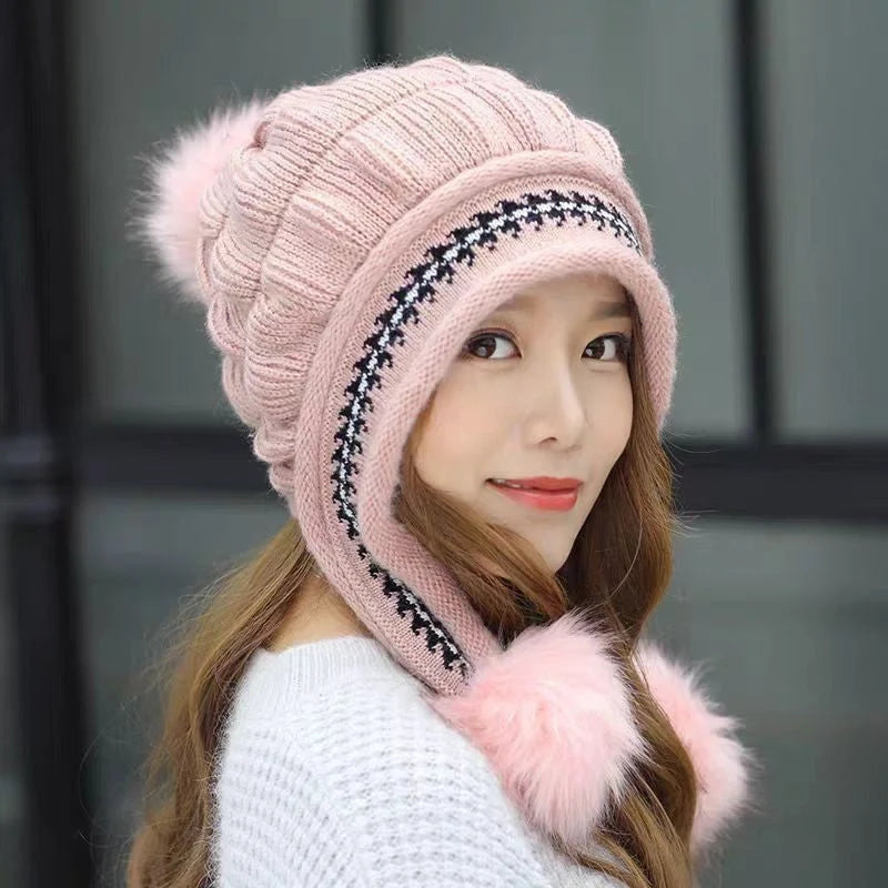 Knit fleece beanie with ear flaps and pompom in various colours for winter warmth