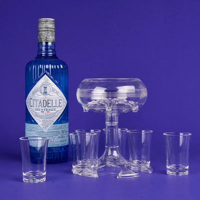Clear six-shot glass dispenser rack holding six shot cups, bar accessory for parties.