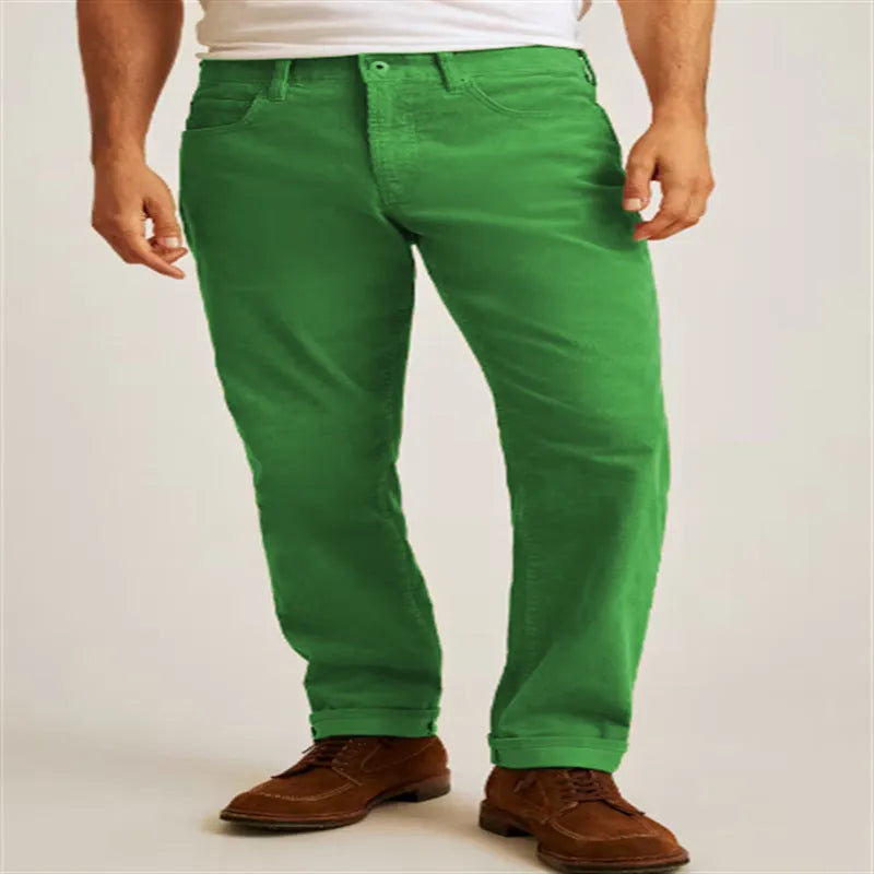 Men's solid colour corduroy trousers in a straight leg, loose casual fit on a hanger.