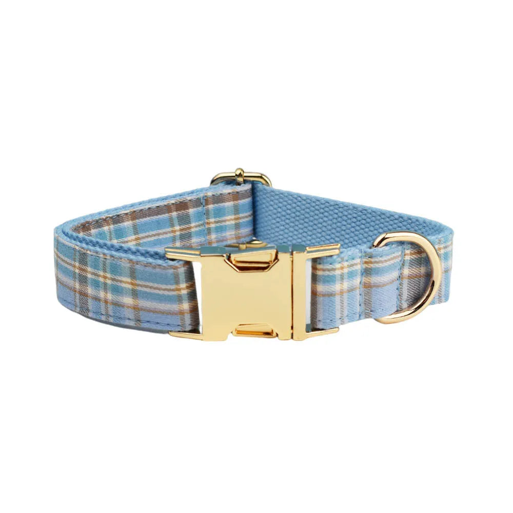 Sky blue grid patterned dog collar, leash, vest, and bow set from the forest series for pets.