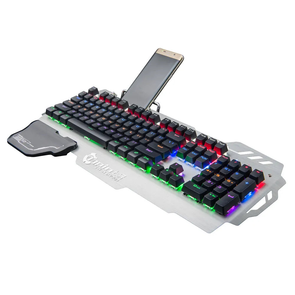 Silver gaming keyboard with green mechanical switches and wrist splint accessory on desktop