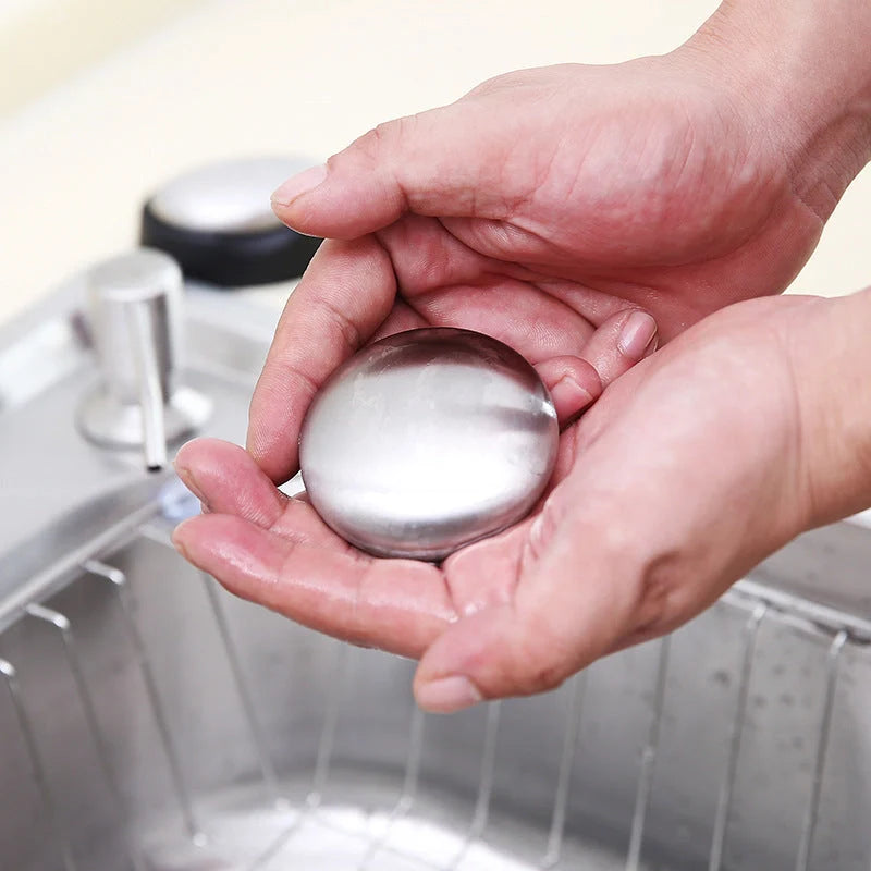 Oval stainless steel soap for removing kitchen odors from hands