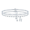 Silver-coloured adjustable copper anklet with a double-circle bead charm.