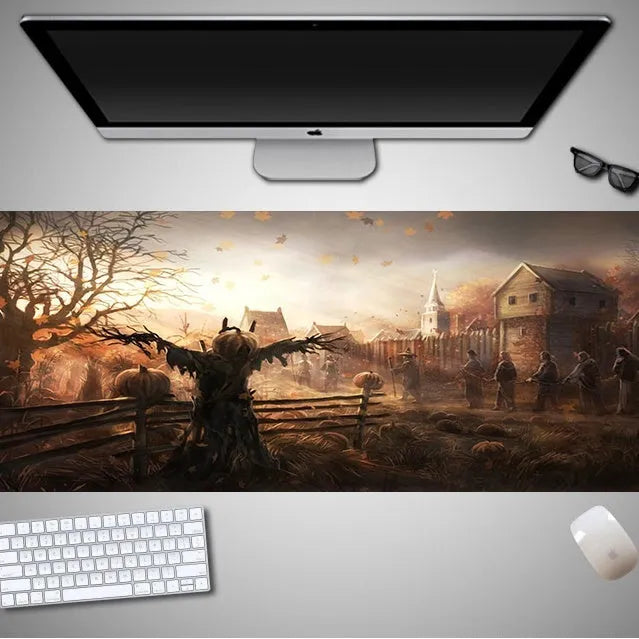 Oversized Halloween themed gaming mouse pad with non-slip rubber cloth base on a desk