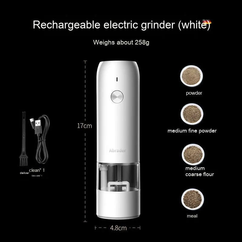 Black and white rechargeable electric pepper and salt grinders with clear acrylic bodies on a kitchen counter.