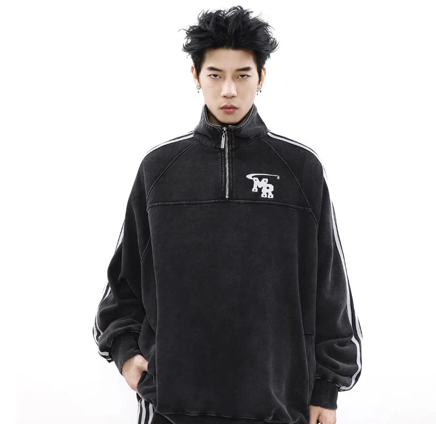 Black Hong Kong style stand collar couple sweater with long sleeves and a coat-style design.