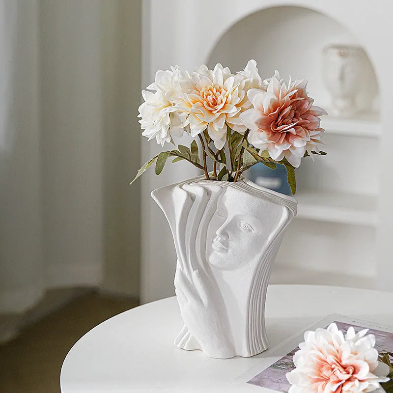 Ceramic book stand in a modern simplicity style, showing one of four available decorative glazed designs.