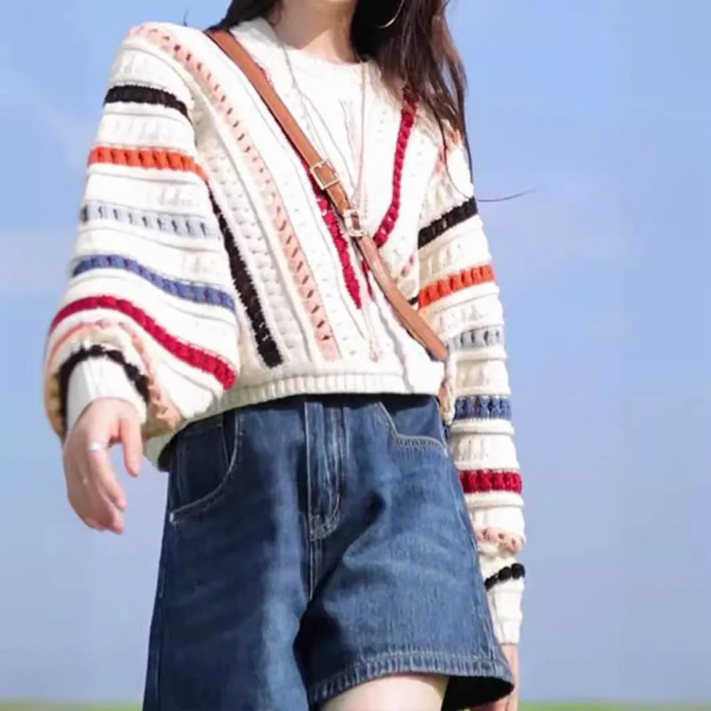 Retro rainbow striped hollow knit sweater with batwing sleeves and colourful thread detailing