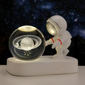 Glowing astronaut crystal ball night light with 6cm resin sphere showing planetary pattern