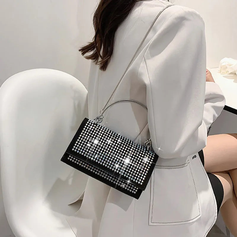 Small square chain crossbody bag for women with rhinestones in silver and black, PU construction with crossbody strap