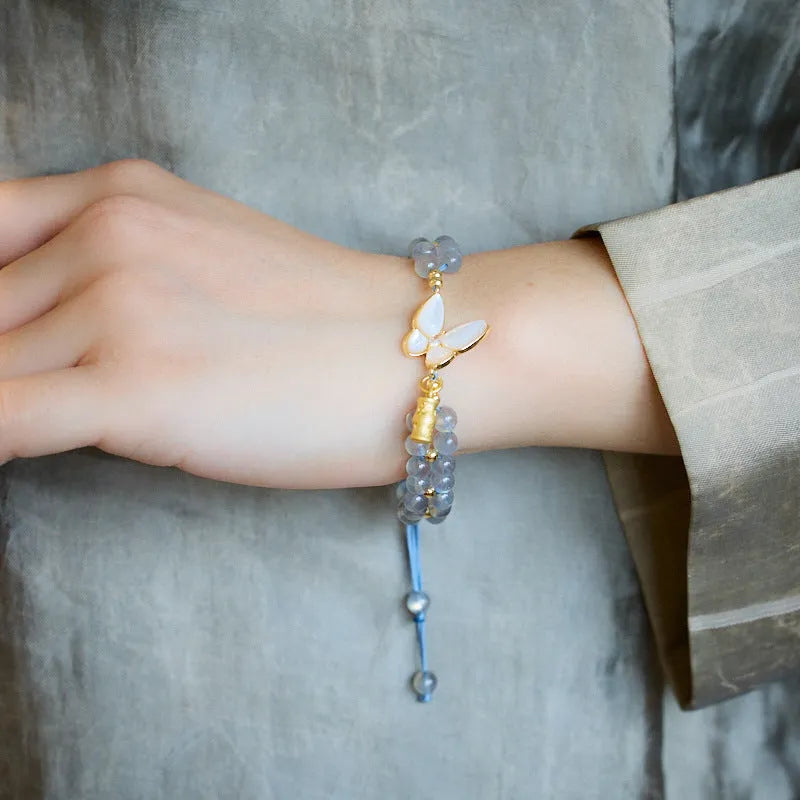 Grey moonstone geometric bracelet with butterfly woven hand rope for women.