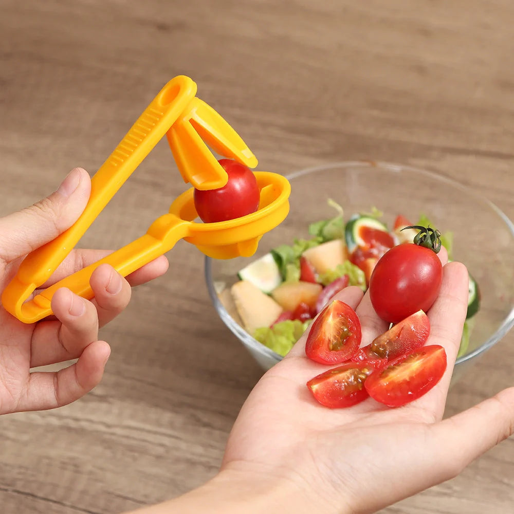 Manual tomato slicer with serrated knife for even dicing, available in red and yellow