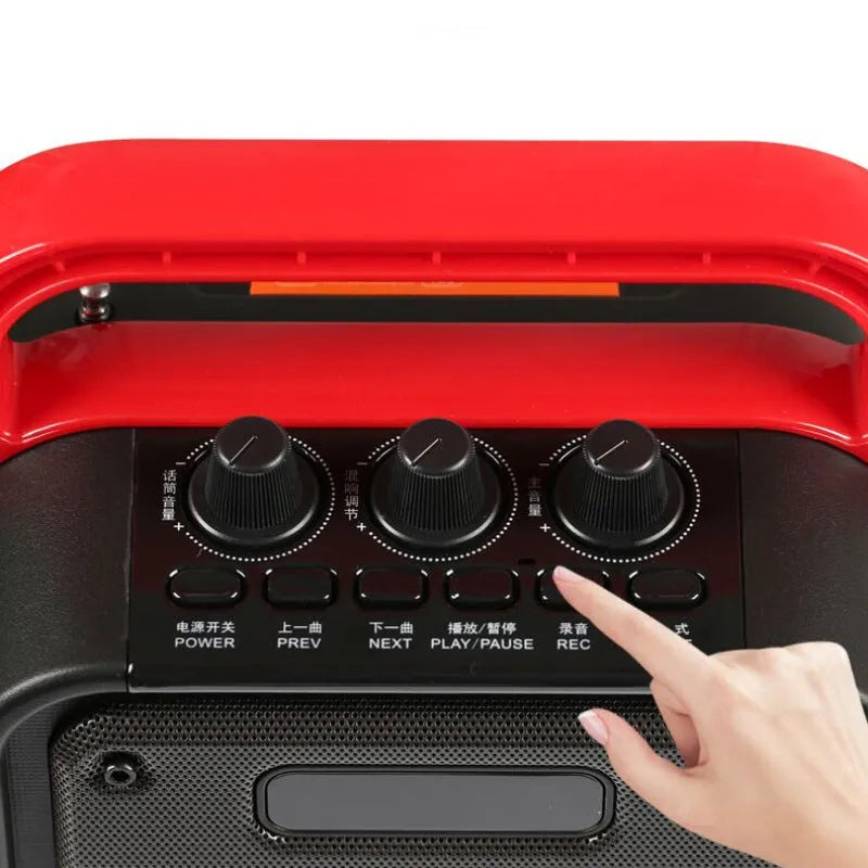 MS62AI black portable Bluetooth speaker with wireless microphone on table