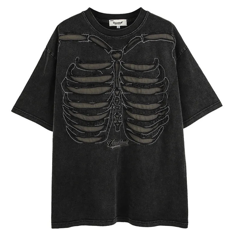 Man wearing a brown loose-fit cotton t-shirt with a large graphic skull print on the front.