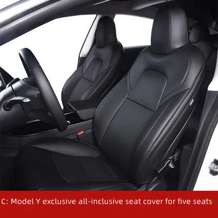 Black PVC chloroprene car seat cover fitted on a Tesla Model 3 front seat.