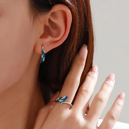 Bright blue feather earring and ring set in alloy with geometric design