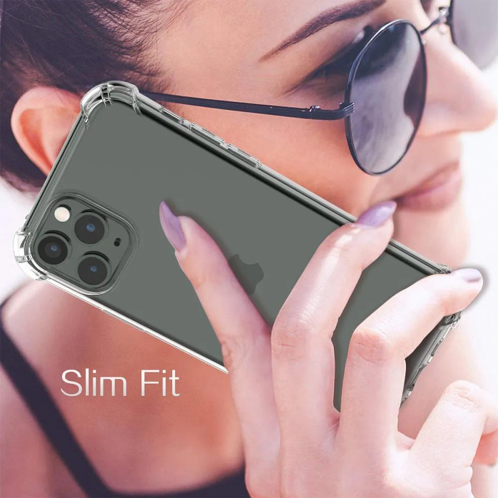 Clear transparent shockproof TPU phone case for Apple iPhone models on a table.