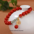 Women's retro bracelet with red sand cinnabar, jade spacer beads, and fu character charm
