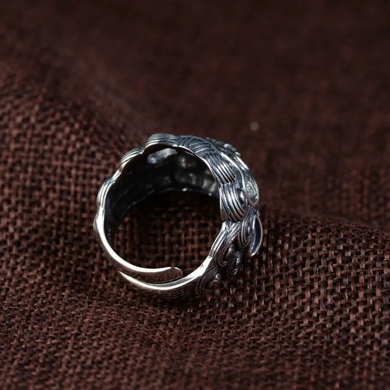 Silver open-style diamond ring with jibeast animal zodiac pattern and retro design details