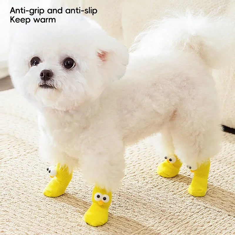 Dog all-season universal cotton socks with cute big eyes, anti-slip sole, green colour, side view on wooden floor