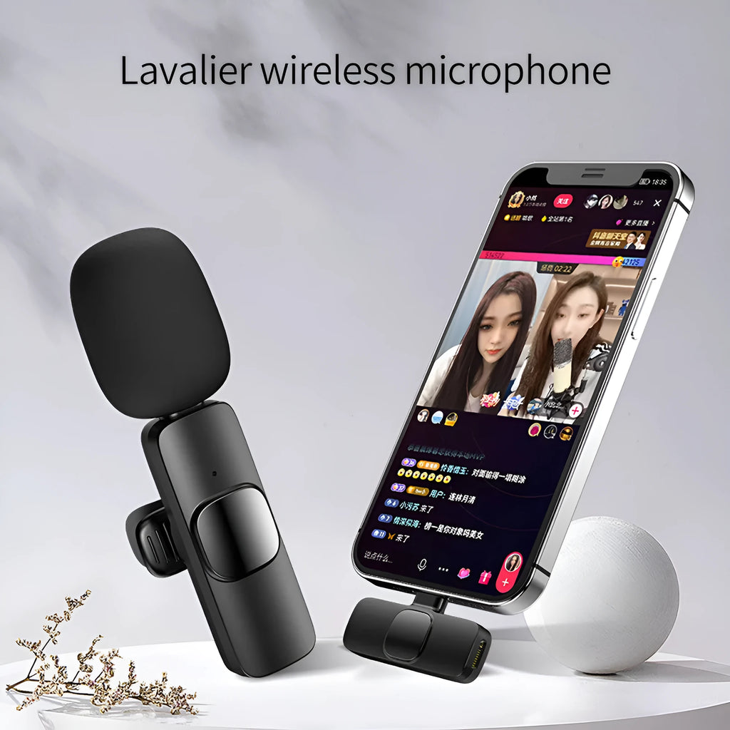 Wireless lavalier microphone with receiver, USB cable, and manual on white background