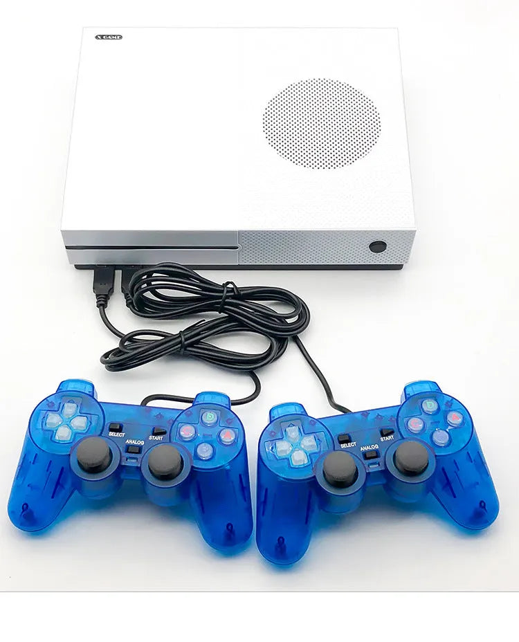 White wired Arcade Xgame joystick TV game console with two controllers, HDMI and AV cables on a table