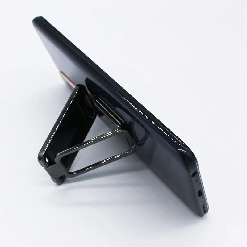 Foldable mobile phone holder in silver, rose gold, black, and gold