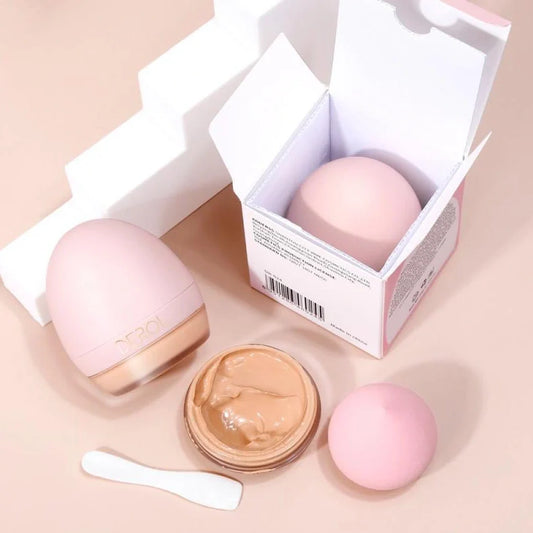 4-colour foundation cream compact with built-in sponge and small spoon applicator