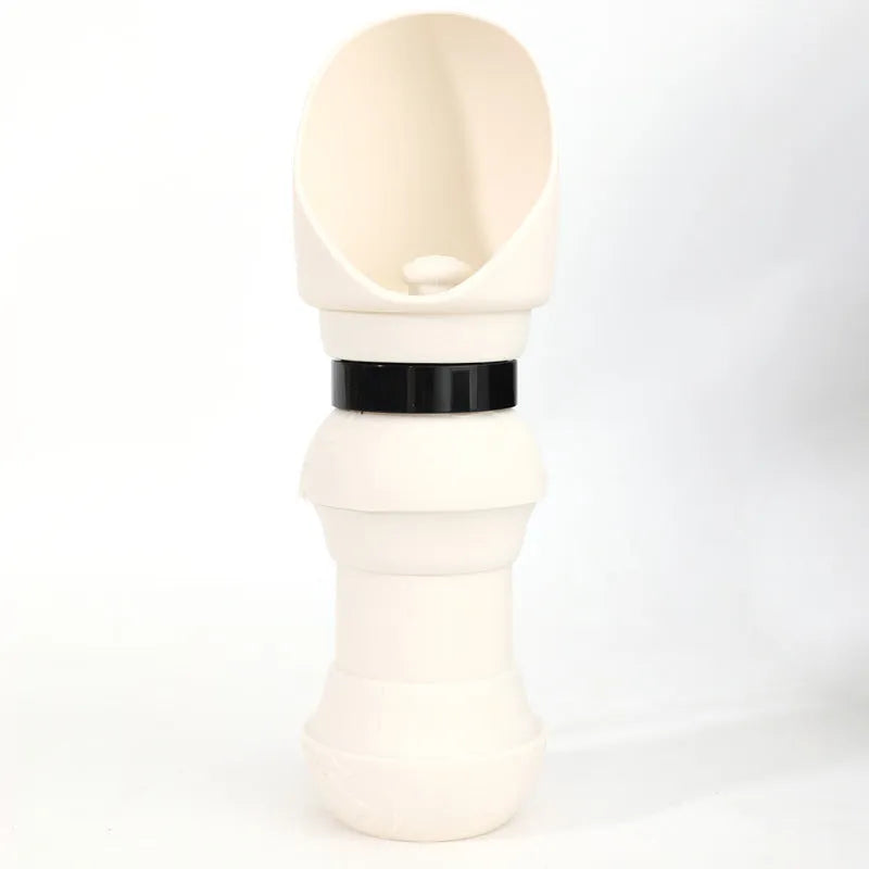 Silicone folding pet water cup shown in pink, collapsed for storage and opened for use