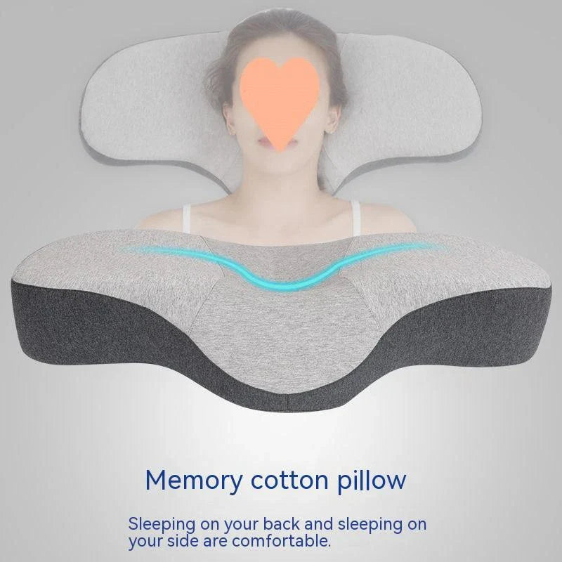 Cozy memory foam pillow with contoured design for optimal neck and spine support, featuring breathable and hypoallergenic materials for a comfortable sleep experience.