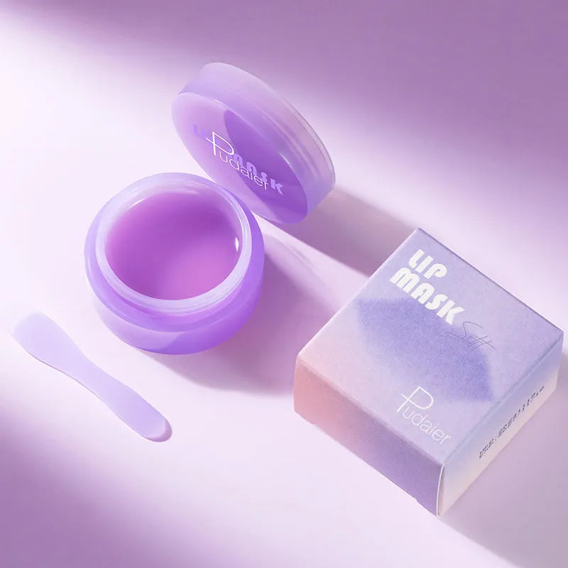 Box containing a 10ml exfoliating lip balm tube and a metal lip scraper tool.