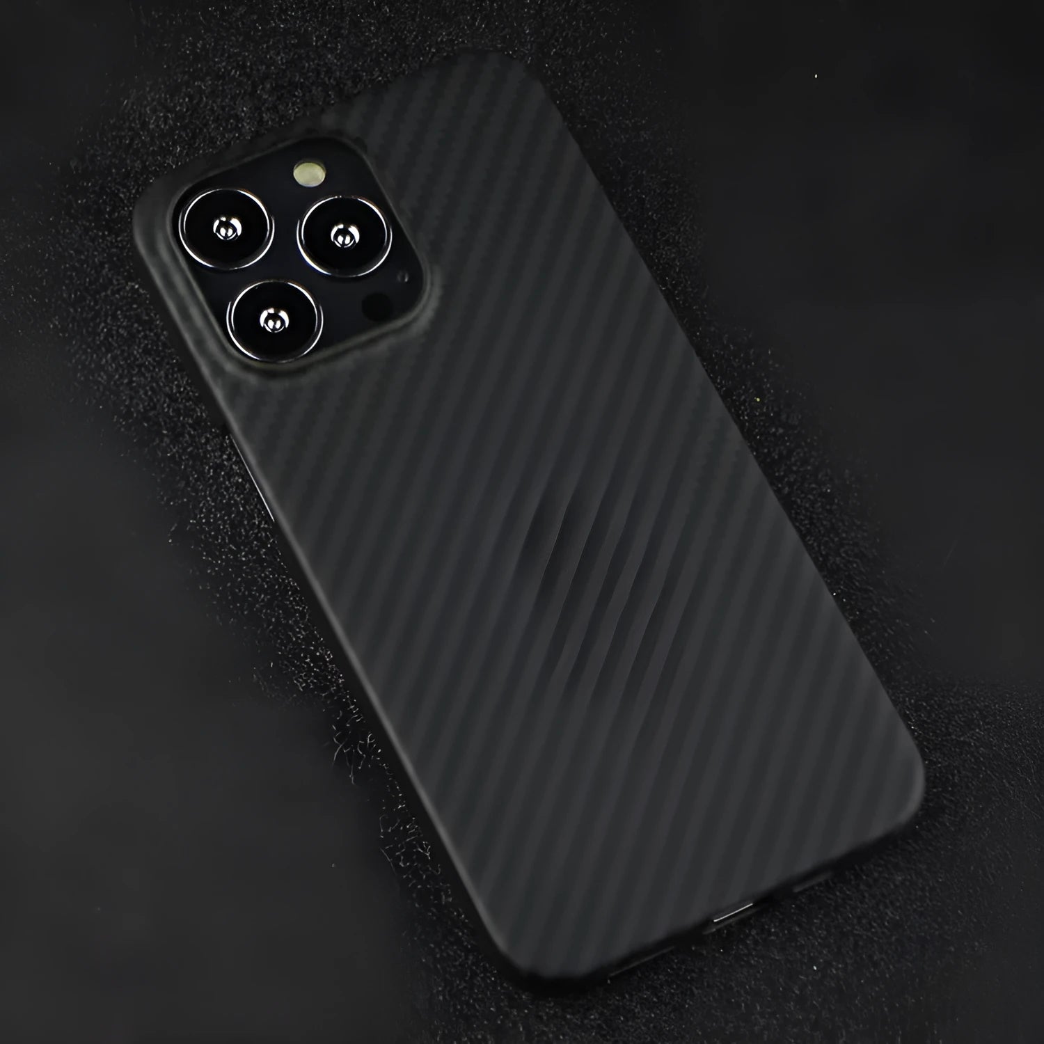 Kevlar fibre iPhone case with stripe design and MagSafe compatibility in dull black texture variations