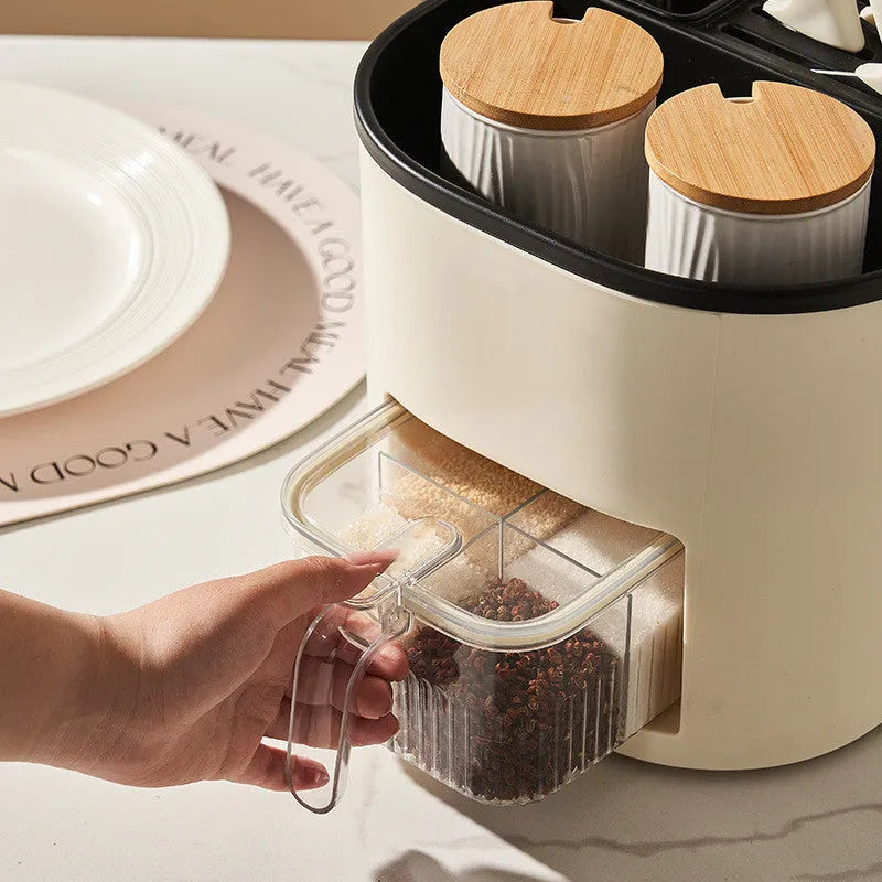 White rotating kitchen storage bucket set with a separate four-compartment spice box for cutlery and utensil organisation.