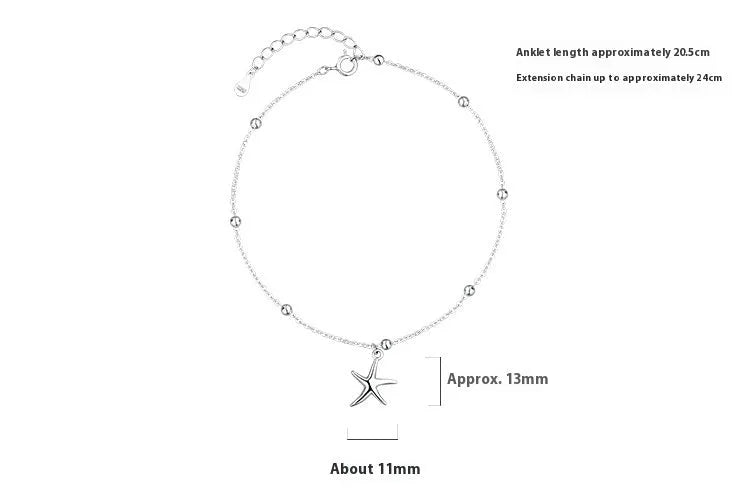 Sterling silver anklet with a starfish charm and round beads on a white background.