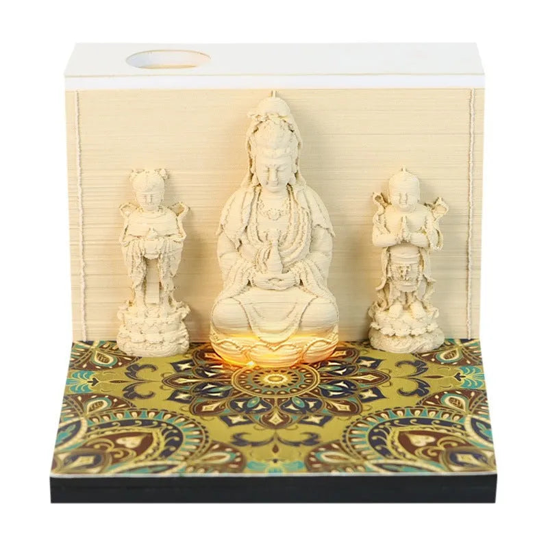 3D paper carving calendar 2026 showing Guanyin Bodhisattva and Sends Wealth Boy in seated lotus design, retro style