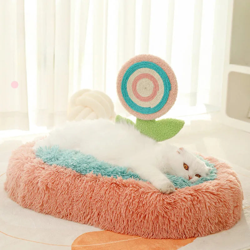 Pink thick plush cat nest bed with high rim and removable cushion in an elliptical lollipop shape.