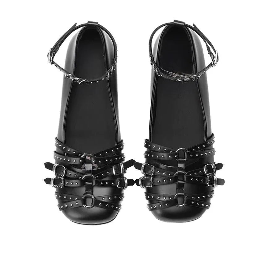Women's black genuine patent leather retro pumps with a buckle and square toe on a low flat heel.